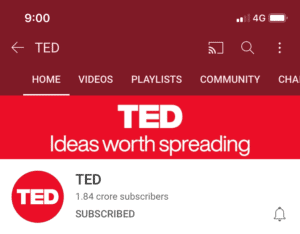 TED的橫幅圖片顯示在移動設備上，紅色背景上顯示著TED的標誌和“值得傳播的想法”。
